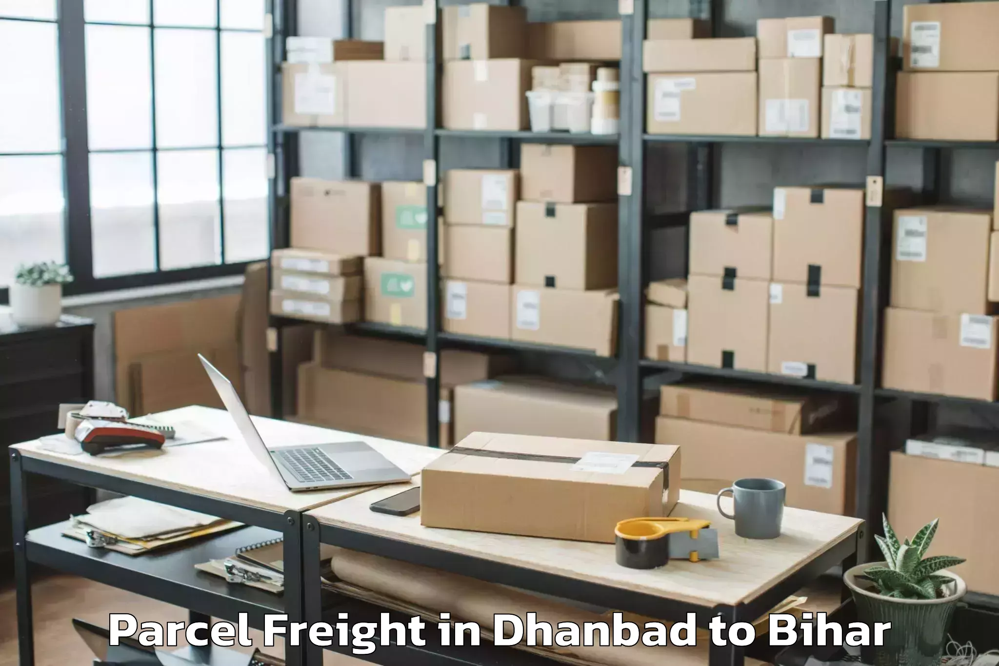 Book Dhanbad to Ghailar Parcel Freight